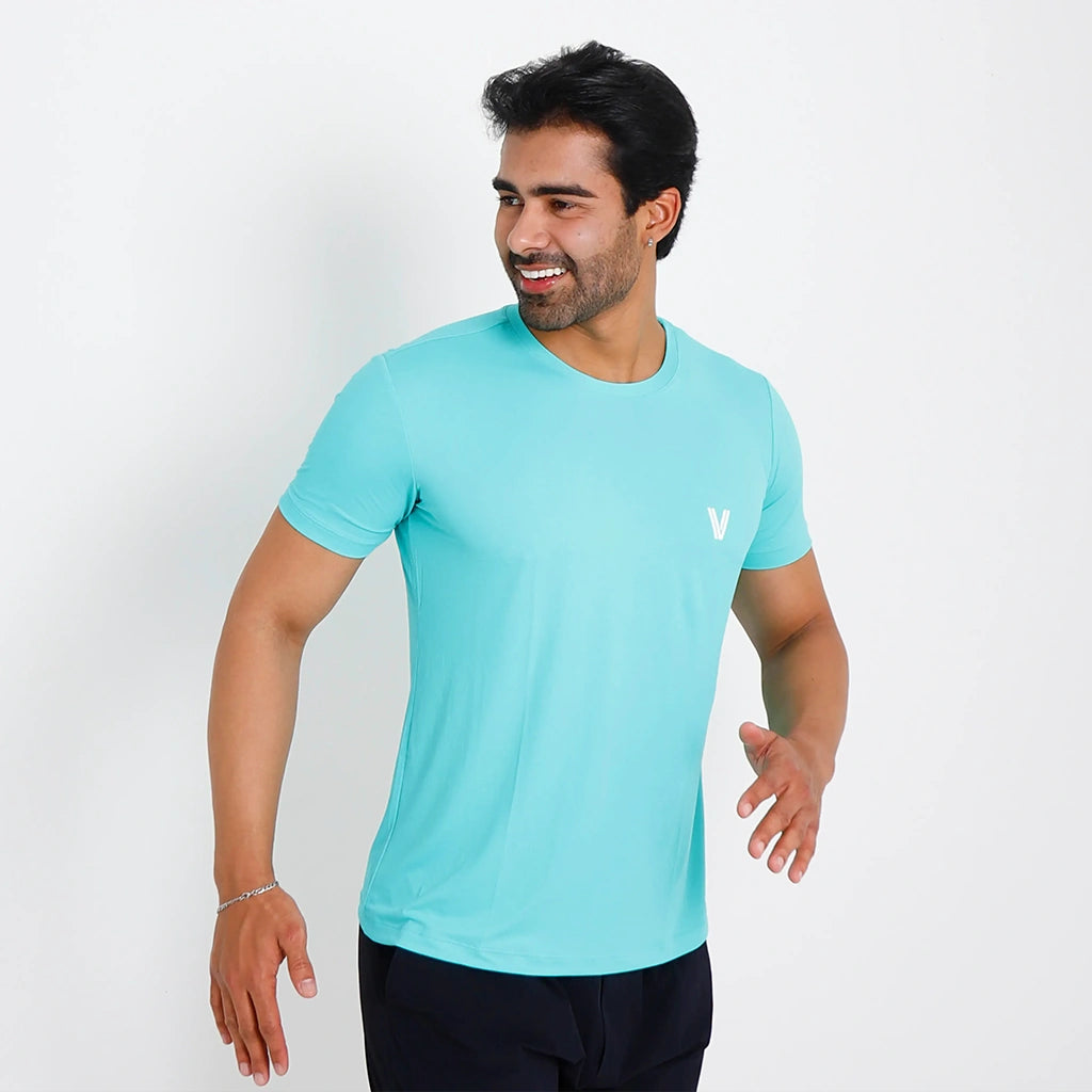 Costas da Camisetas Poliamida Esportiva verde-água; modelagem regular e acabamento limpo para rotina urbana.